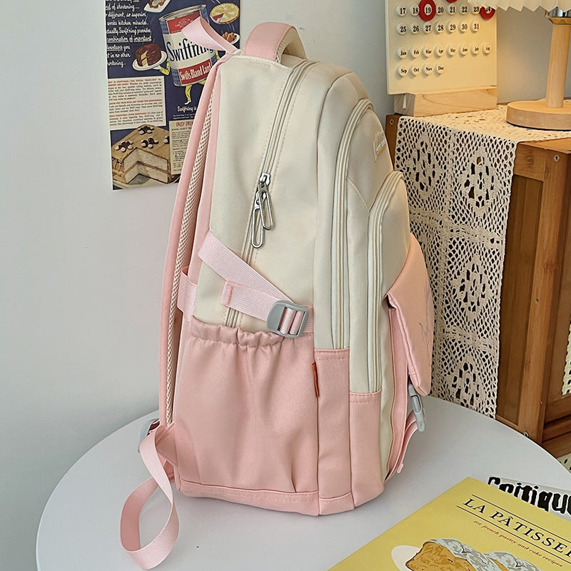 New primary school students, junior high school students, burden-reducing schoolbags, fashionable contrasting colors, lightweight, large-capacity waterproof backpacks