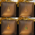[titanium steel] copper plated real gold pendant micro-embedded classy sense maple leaf necklace women's niche design sweater chain jewelry