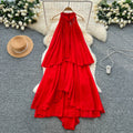 French-inspired, three-dimensional floral halter neck sleeveless dress for women. loose-fitting, slimming, casual, and featuring an asymmetrical hem in a vibrant red