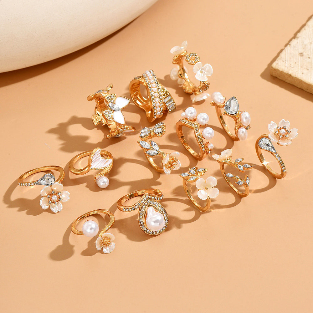 Vintage-inspired floral ring set - 13 piece collection. unique, high-end, and versatile. features faux pearls and diamond accents