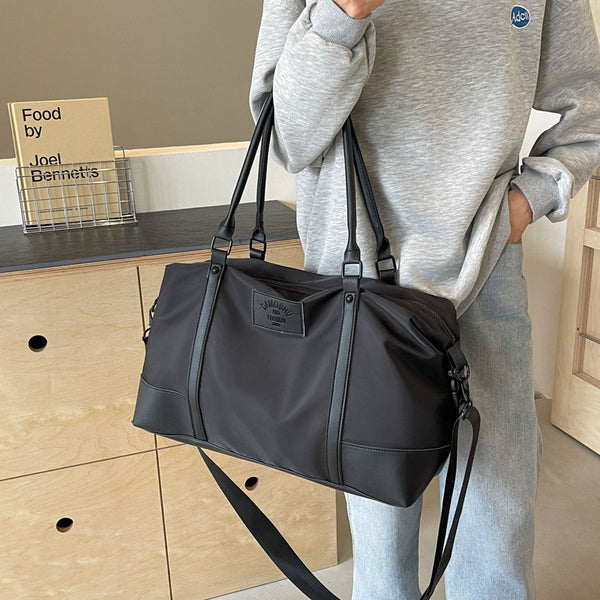 Travel bag Women's large-capacity portable light luggage bag Short business trip Travel storage bag Birth bag Cover trolley case