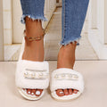 Wholesale women's plush slippers for cross-border e-commerce: new european and american style pearl-embellished one-strap fuzzy slippers, warm autumn/winter home slippers