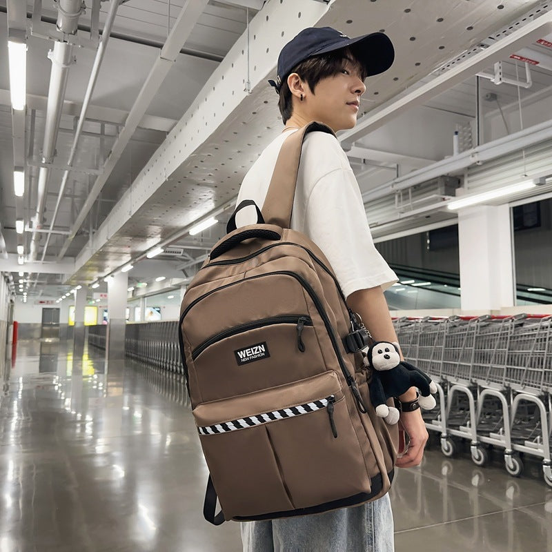 School bag male large capacity junior high school student middle school student fashion trend simple backpack female business travel bag