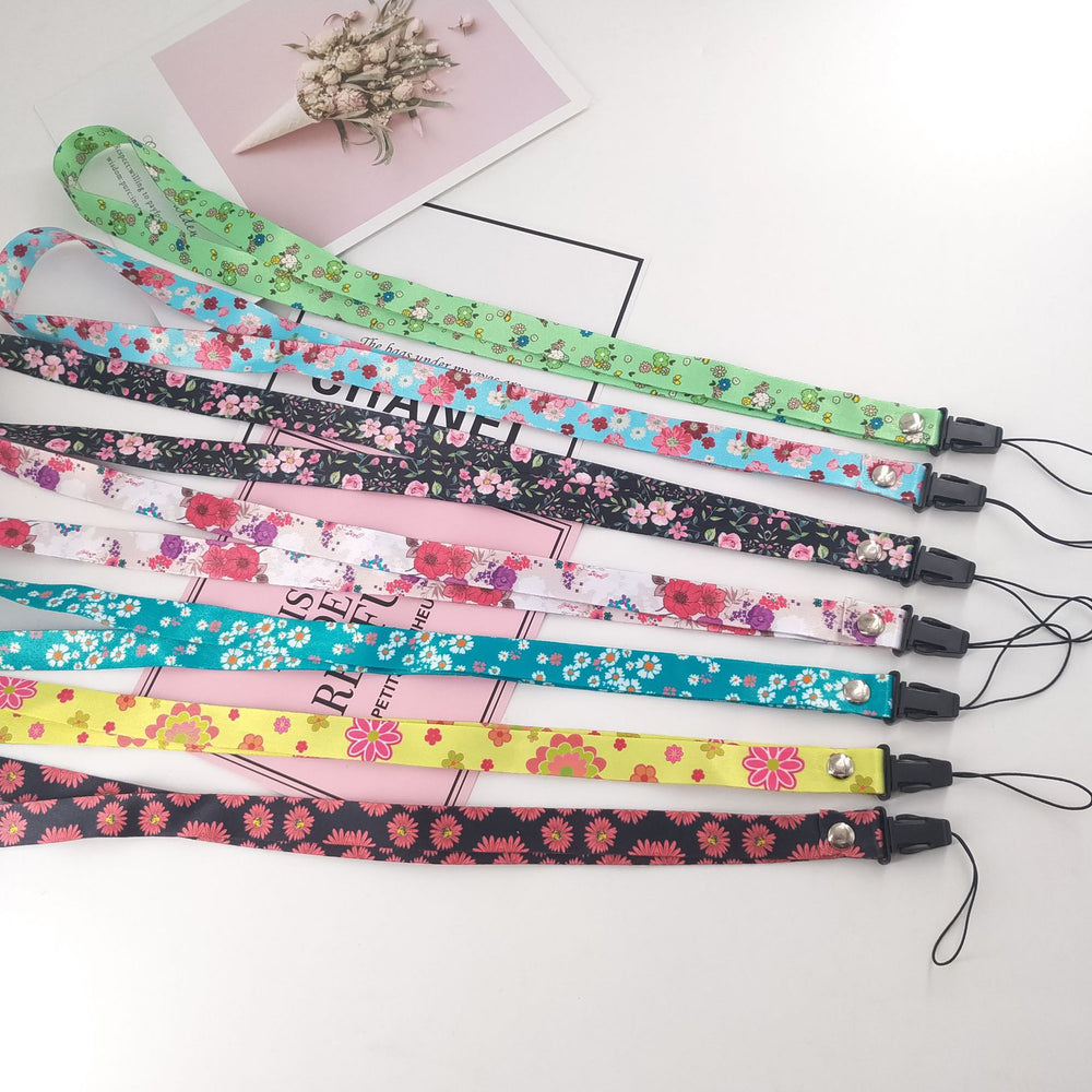Mobile phone lanyard cartoon hanging rope anti-fall series cute floral creative must-have wholesale anti-falling bow