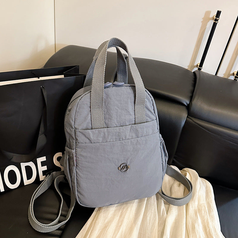 Cross-border casual versatile simple small backpack 2025 new travel backpack lightweight chest back double shoulder dual-purpose bag women