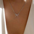 Wholesale bowknot necklaces - european & american cross-border jewelry - minimalist fashion pendants - women's alloy diamond-studded chokers & sweater chains