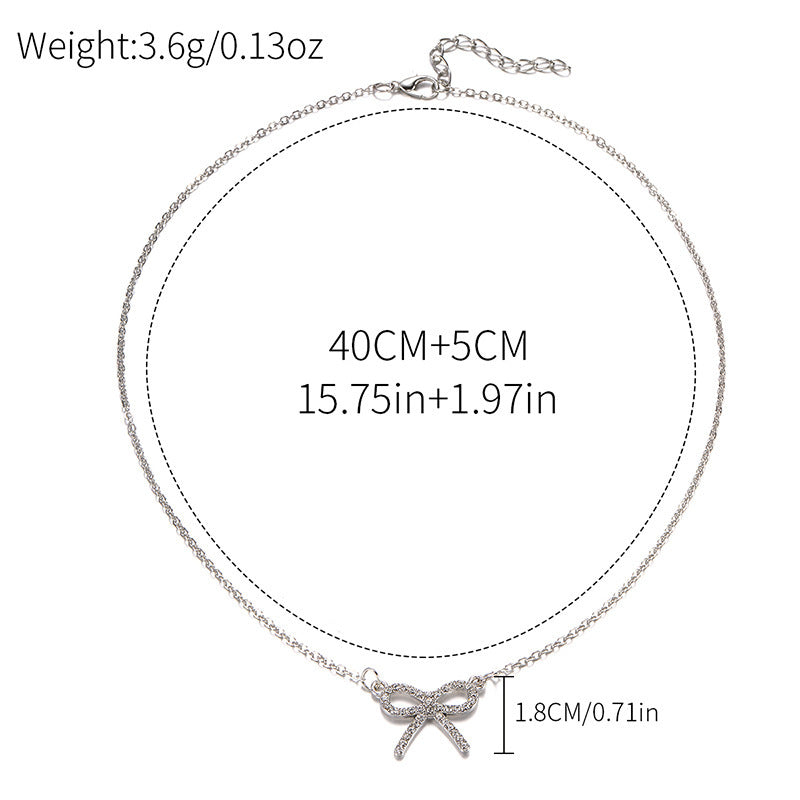 Customized necklaces: european and american cross-border jewelry, minimalist fashion bow pendant, women's zinc alloy diamond-studded necklace