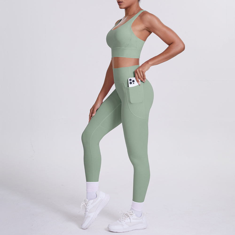 New arrival cross beautiful back cloud sense tight yoga suit suit women's high waist hip pocket sports fitness suit two-piece set