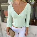 hot-selling new women's solid color v-neck three-quarter sleeve shirred casual slim-fit top t-shirt wholesale