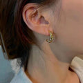 European and american c-shaped cable stitch earrings retro horn thread hollow earrings for women fashionstylishsense of design earrings