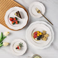 European-style pure white dessert plate, three-tier fruit platter, modern showroom display, creative embossed ceramic plate wholesale