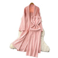 Minimalist solid color knitted mature woman's winter set: slim-fit bandeau dress with long cardigan coat