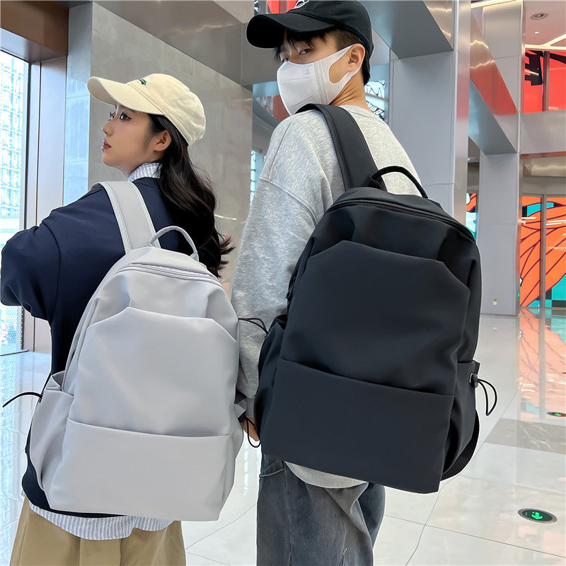 Campus Japanese backpack versatile male and female junior high school college student schoolbag solid color casual large capacity travel backpack