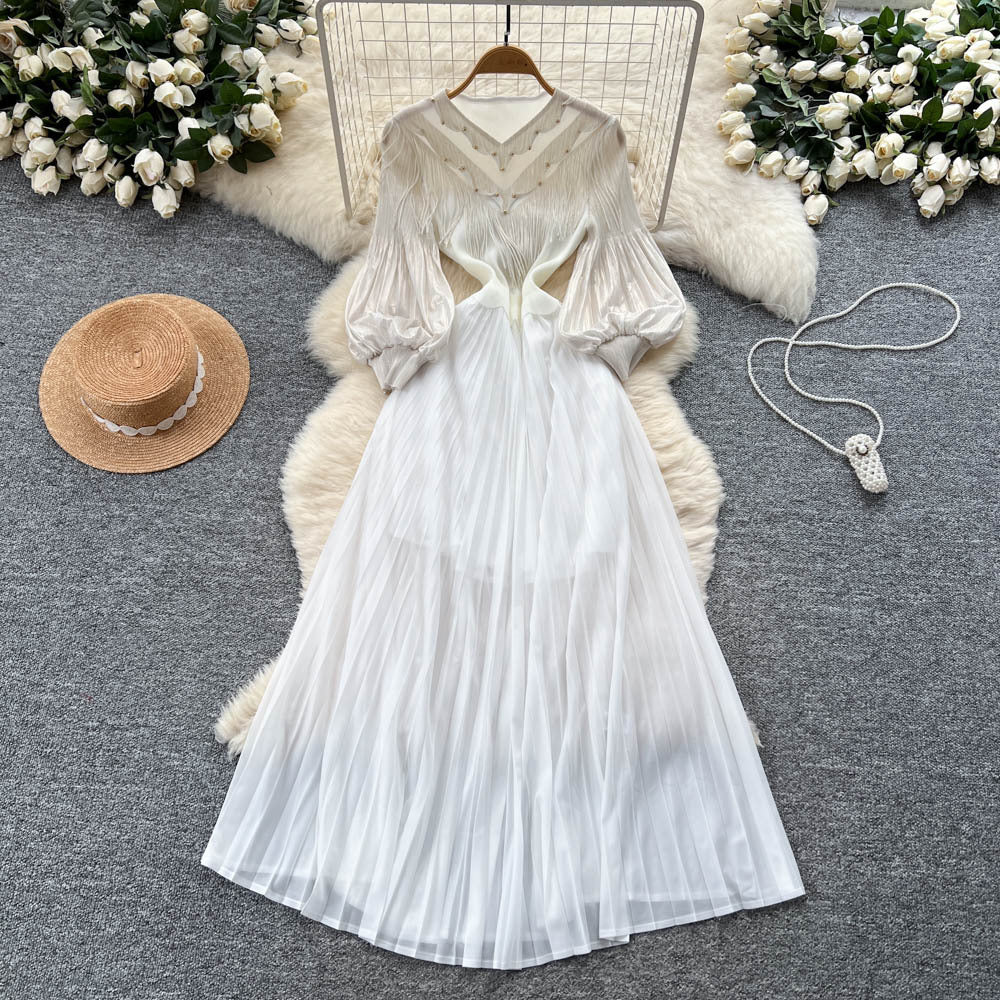 Elegant court-style bubble sleeve dress - women's autumn tassel design, mature and chic, flowy maxi dress