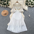 Elegant court-style bubble sleeve dress - women's autumn tassel design, mature and chic, flowy maxi dress