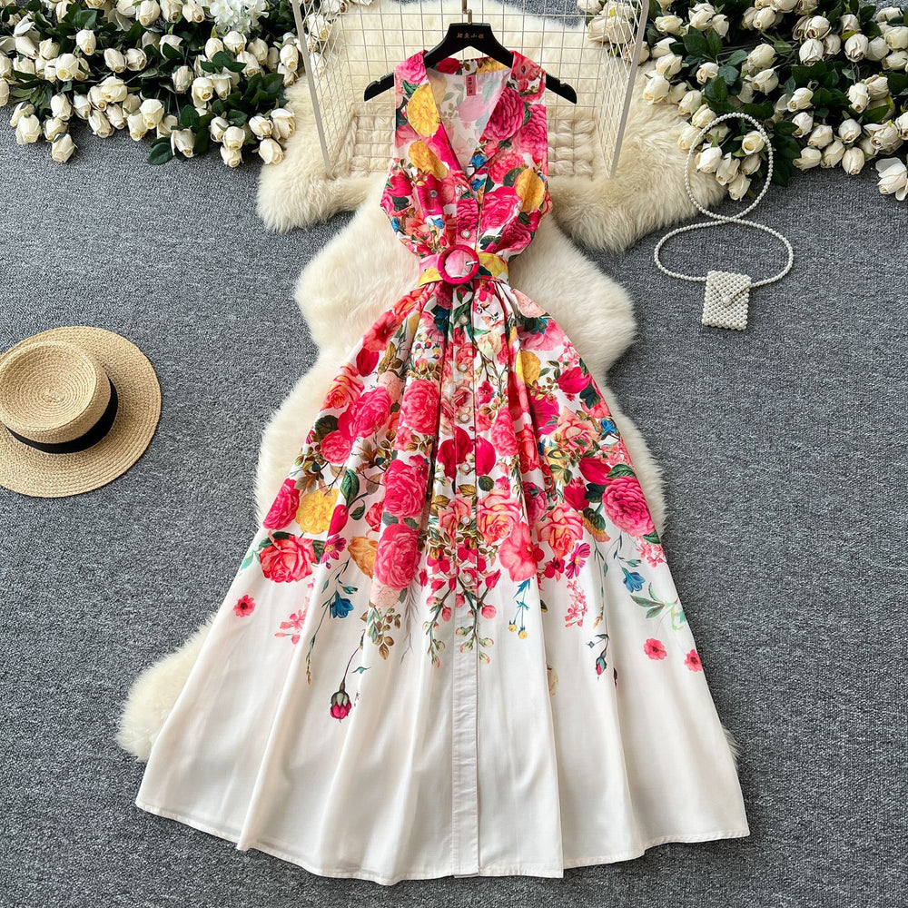 early spring new arrival: women's unique & elegant sleeveless midi dress with notch collar, cinched waist, single-breasted button detail, and flowy printed skirt