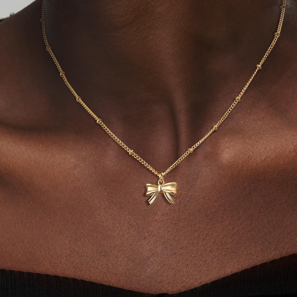 European and american new arrival: high-end bowknot necklace - women's fashionable, minimalist, and unique gold clavicle chain - stylish and versatile necklace