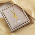 Letter i---gold