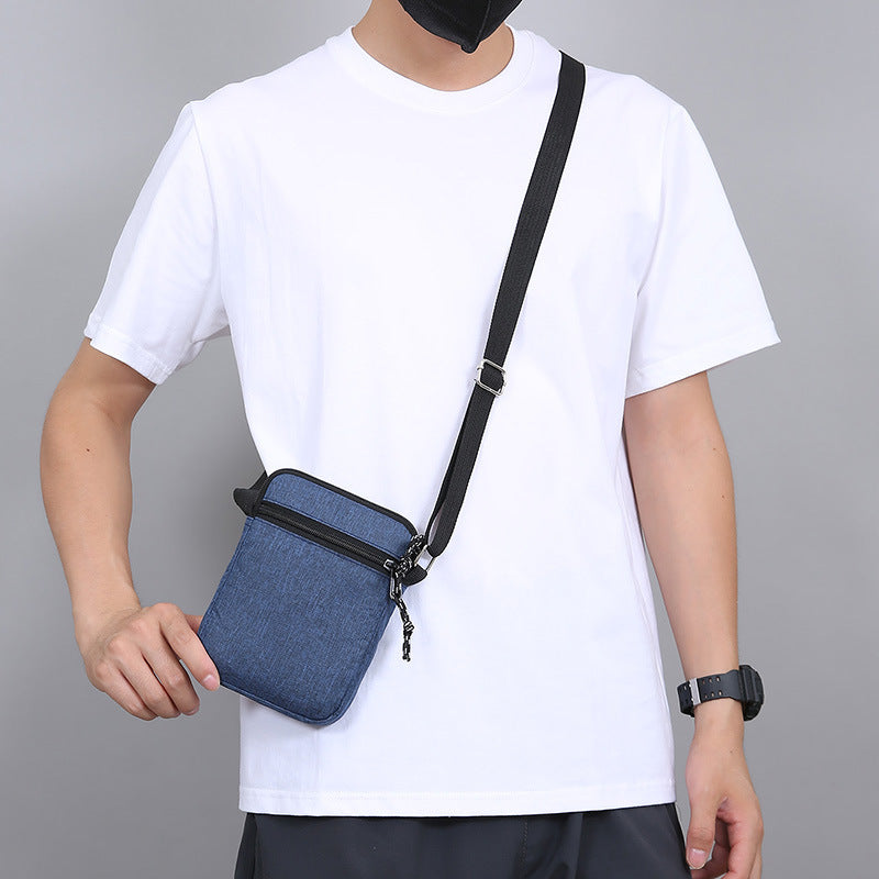 Foreign trade new light and portable shoulder bag men's casual simple mobile phone canvas bag outdoor trendy messenger bag