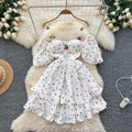 spring/summer sweet one-shoulder cami dress with bubble short sleeves, cherry print, cinched waist, and ruffle hem
