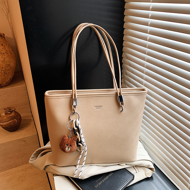 This year's trendy solid color women's bag: 2026 new fashion shoulder tote bag, versatile for commuting and casual use, women's handbag