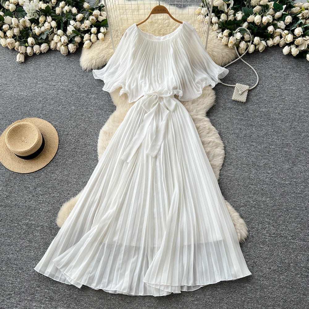 French-inspired pleated dress for women, featuring a bow tie, off-the-shoulder design, tie-waist, and flattering pleats for an elegant and sophisticated look