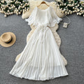 French-inspired pleated dress for women, featuring a bow tie, off-the-shoulder design, tie-waist, and flattering pleats for an elegant and sophisticated look