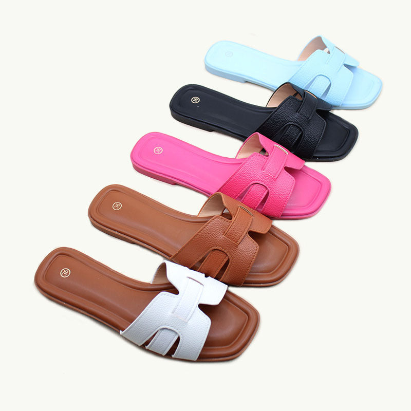 Hot selling Wholesale spot flat slippers women's beach shoes versatile fashion one-character sandals