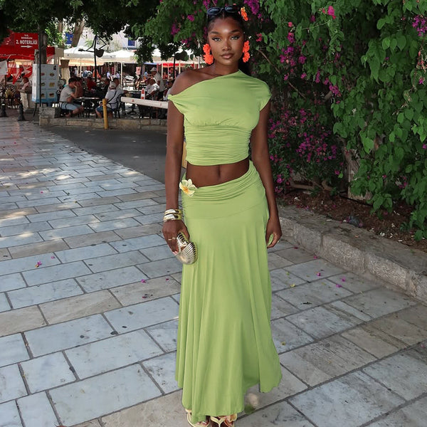 European and American  women's clothing, off-the-navel casual street skirt set, fashionable pleated oblique collar, shoulder top, two-piece set, trendy