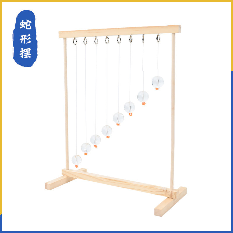 Serpentine pendulum law of conservation of energy handmade DIY technology small production students invent STEAM teaching aids classroom experiment