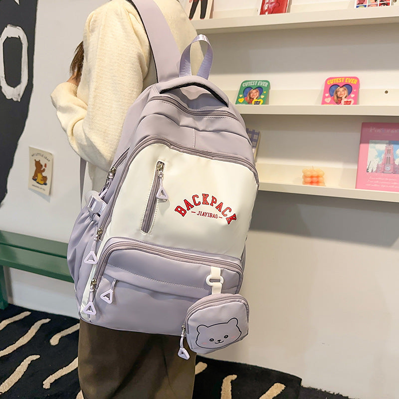 Small fresh student schoolbag, cute, fashionable and high-value backpack, large-capacity texture splicing contrasting color backpack.