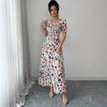 new european and american style floral midi dress with square neck, puff short sleeves, ruched bust, and a-line silhouette