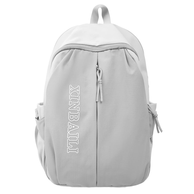 Outdoor schoolbag male large capacity junior high school student middle school student fashion trend simple backpack female style travel bag