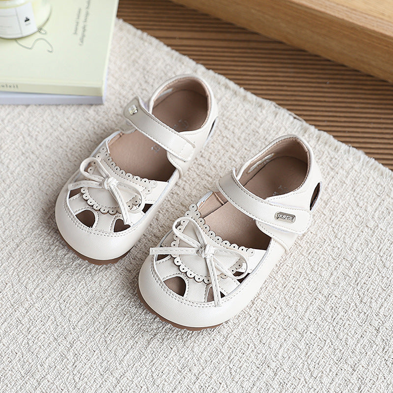 New girls' sandals: summer kids' fashion bow solid color princess shoes, soft sole hollow-out classic leather shoes