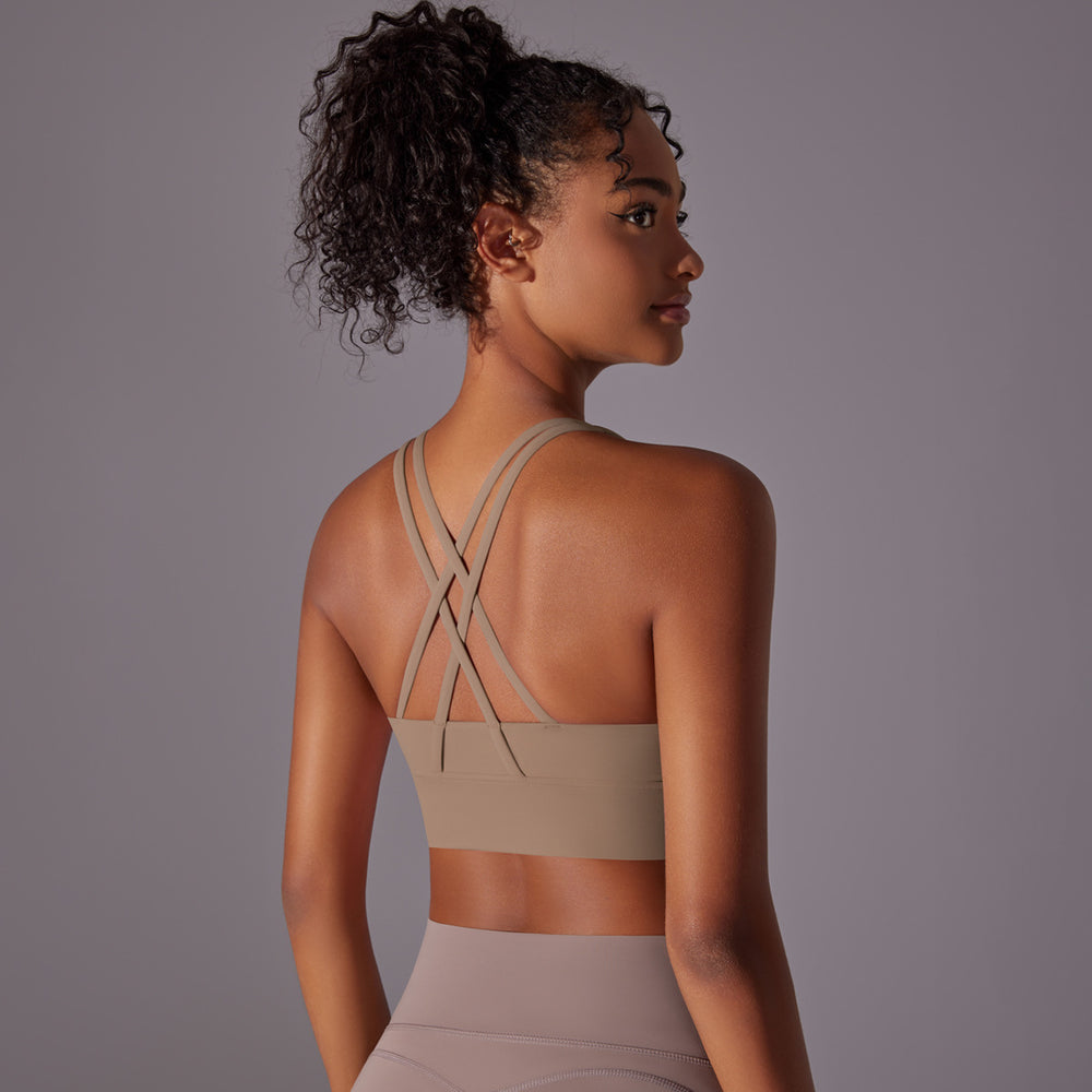 Fashion nude yoga vest women's cross back sports intimates bubble wrap push up seamless one-piece cup fitness bra