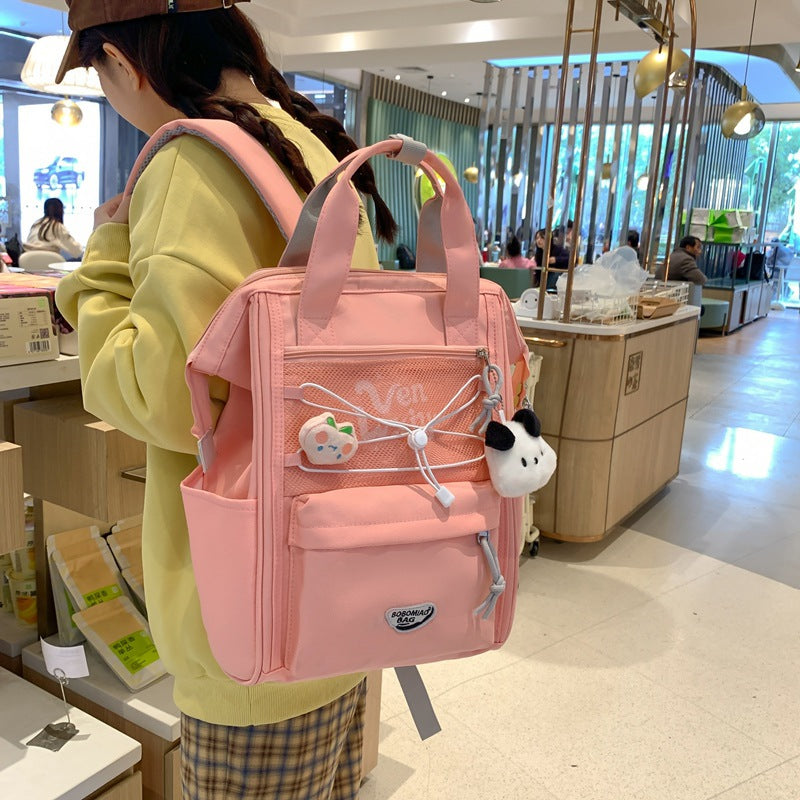 School bag Female college student Junior high school student Large capacity backpack Simple computer backpack Women's fashion casual bag