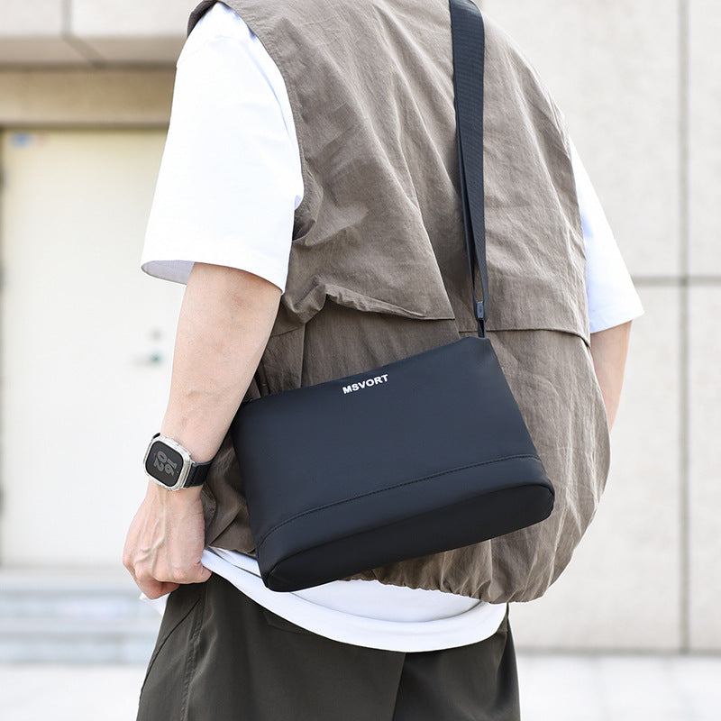 Cross-border new casual men's shoulder bag lightweight black versatile commuter men's bag Korean version trendy ins messenger bag