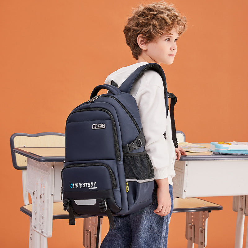 School bag for boys, primary school students, grades 3 to 5 and 6, junior high school students, large-capacity children's backpack, spine protection and burden reduction backpack