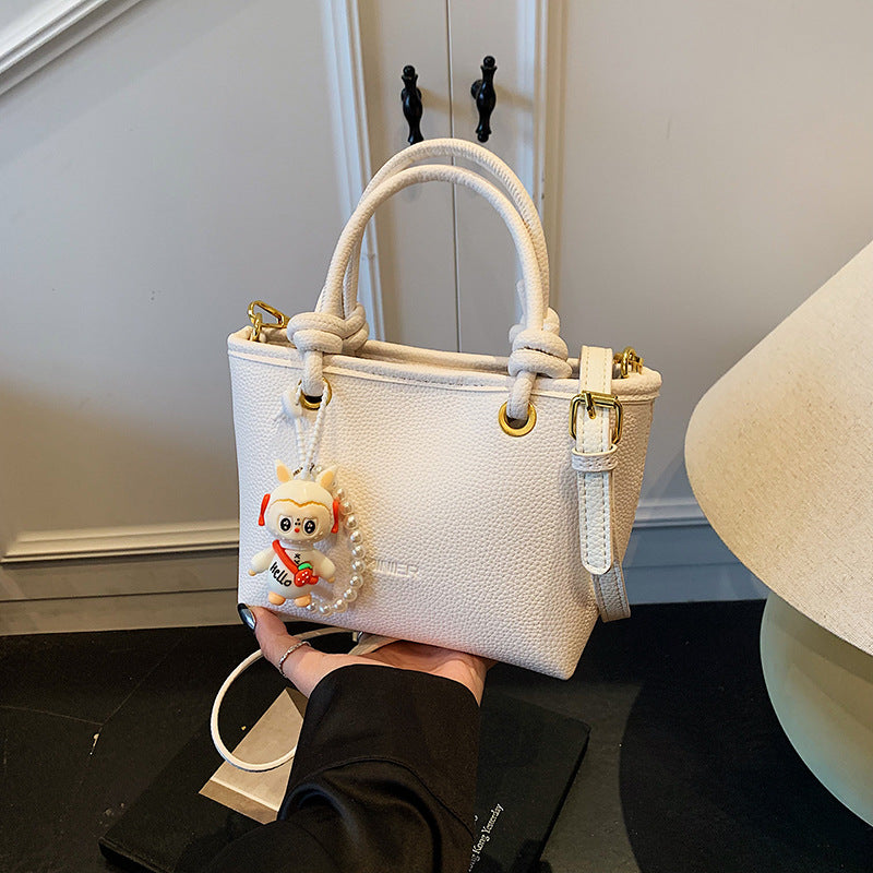 Foreign trade advanced sense hand carrying bucket bag 2025 summer simple and versatile shoulder bag trendy niche design messenger bag