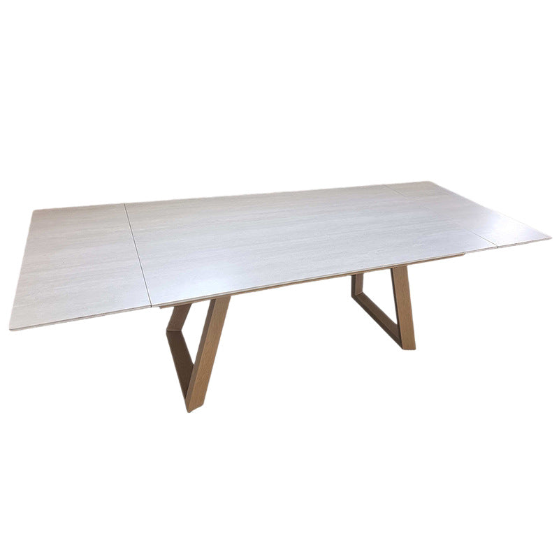Off-white travertine slab extendable dining table - modern minimalist iron frame legs - rectangular expandable dining table for home restaurant