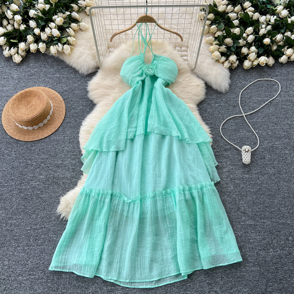 Beach vacation dress for women, atmospheric cut out, breast-revealing halter suspender, stereo flower, asymmetrical fairy long skirt