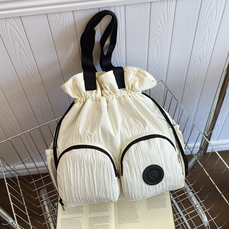 Cross-border college style high-value large-capacity backpack women's 2025 new niche pleated drawstring shoulder bag