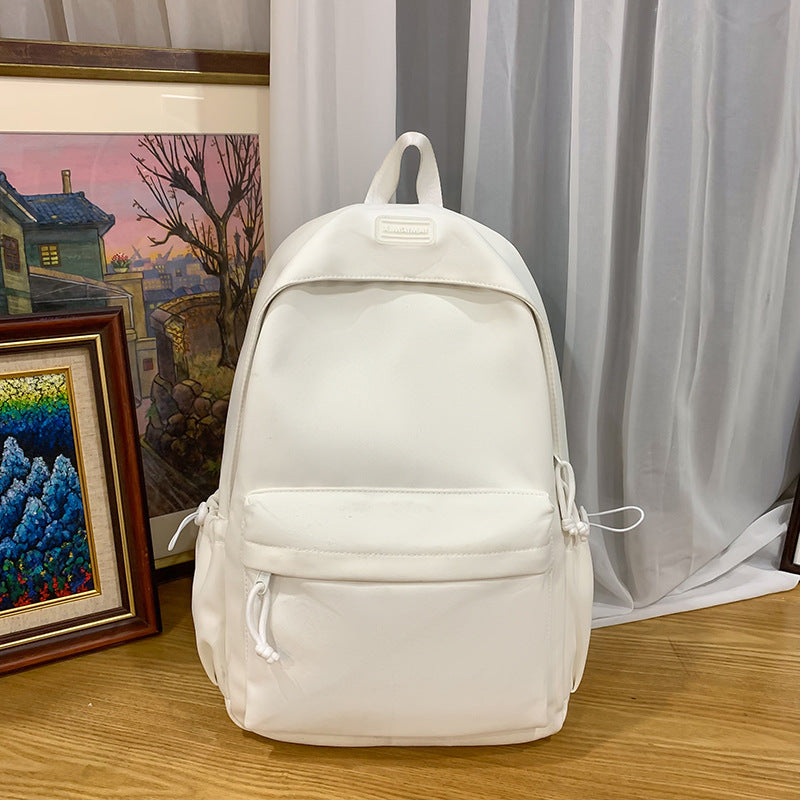 Japanese-inspired, effortlessly chic backpack. new, sweet, solid-color design for elementary school students. a fresh, versatile, lightweight backpack perfect for school