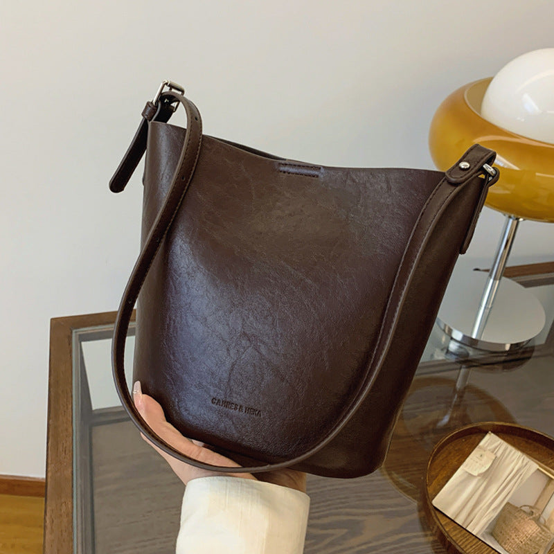 Retro niche design bag women's 2024 new simple messenger bag high-end fashion shoulder bucket bag
