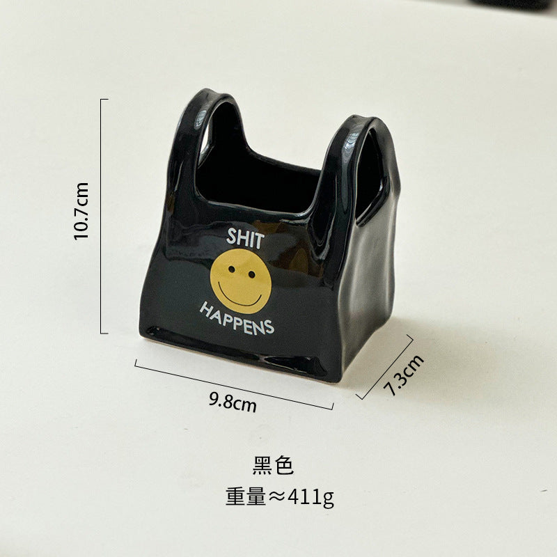 Personalized hand pinch bag desktop creative ceramic pen holder remote control stationery storage box makeup pen storage bucket small ornament