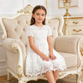 wholesale girls' dresses: lace-trimmed midi skirts, white minimalist style, children's clothing