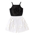 e-commerce: new autumn/winter collection for kids - black camisole top + white shorts