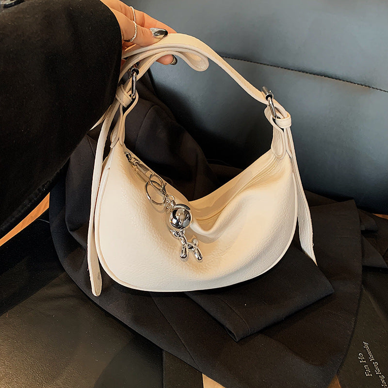 Cross-border niche soft leather lychee pattern portable dumpling bag women's 2025 new high-end fashion shoulder messenger bag