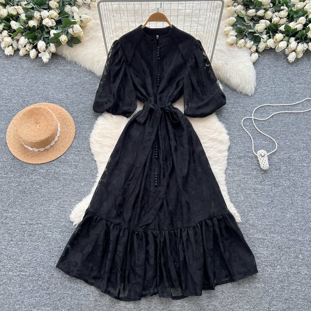 French-inspired v-neck floral chiffon dress with flared sleeves, tie waist, and a figure-flattering, vintage-inspired silhouette