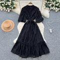 French-inspired v-neck floral chiffon dress with flared sleeves, tie waist, and a figure-flattering, vintage-inspired silhouette